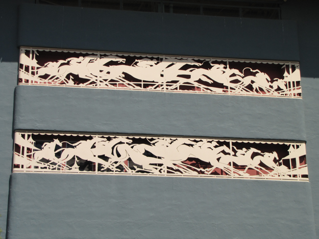 A lively punched metal frieze runs across the grandstand rear façade. Photo: Joshua Smelser.