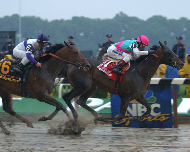 Empire Maker defeats Ten Most Wanted and Funny Cide in the 2003 Belmont Stakes. Photo: NYRA/Adam Coglianese.