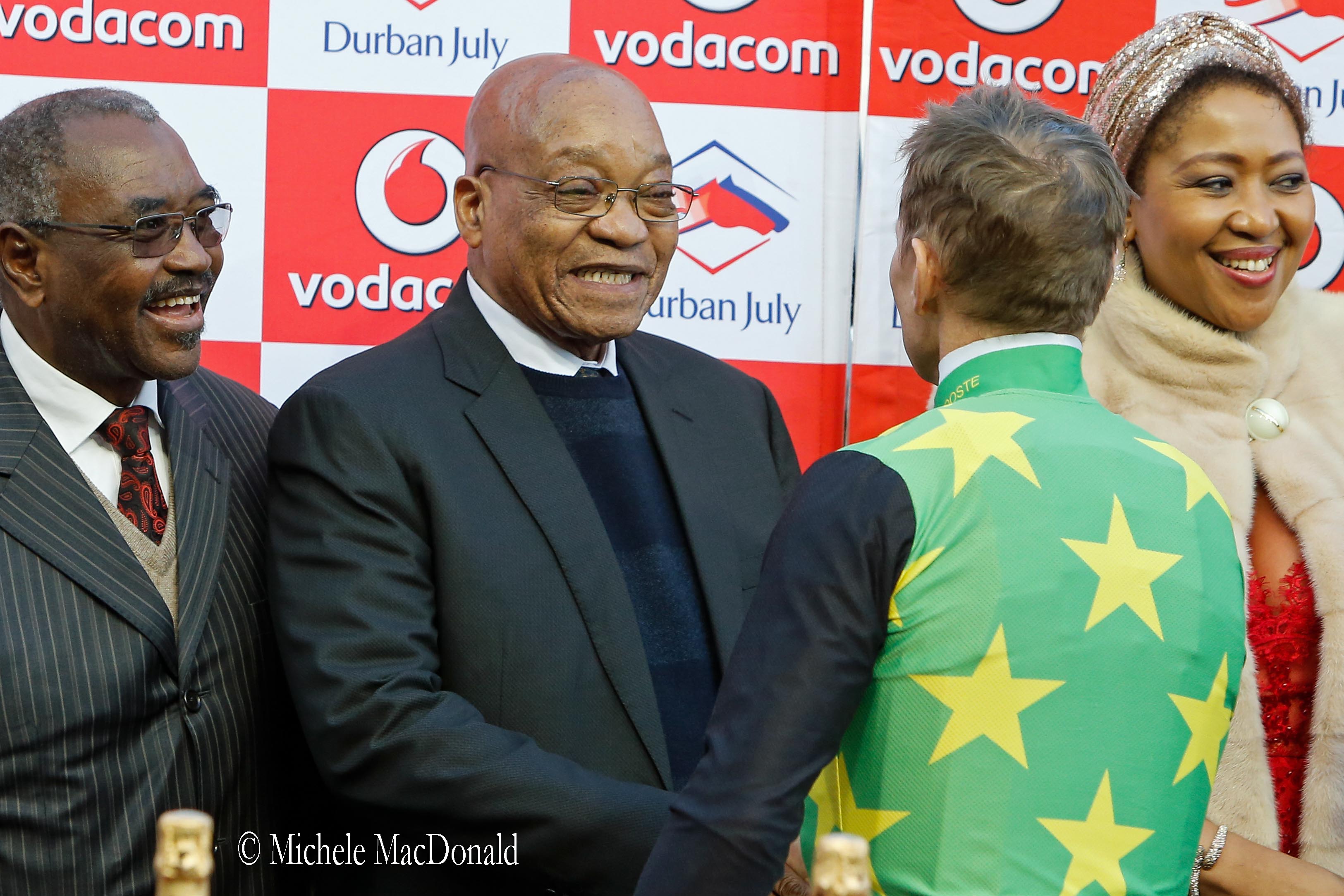 South African President Jacob Zuma was greeted by choruses both of cheers and catcalls at last year’s presentations. Here is meets Pierre Strydom. Photo: Michele MacDonald