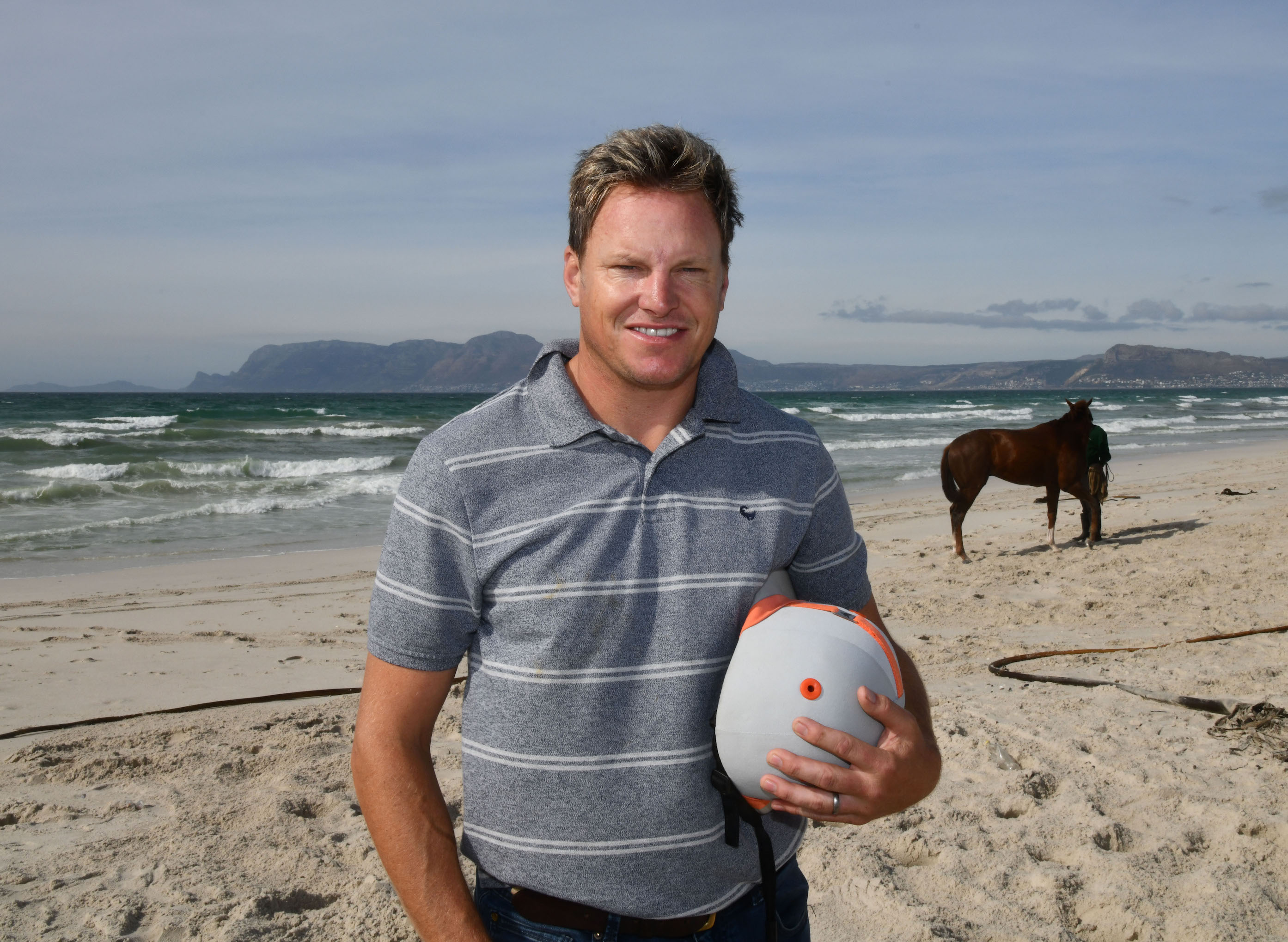 Trainer Justin Snaith with his string on the beach at Cape Town: “If I see a race anywhere in the world and my horse is good enough, I’d like to be there,” he says. Photo: Hugh Routledge