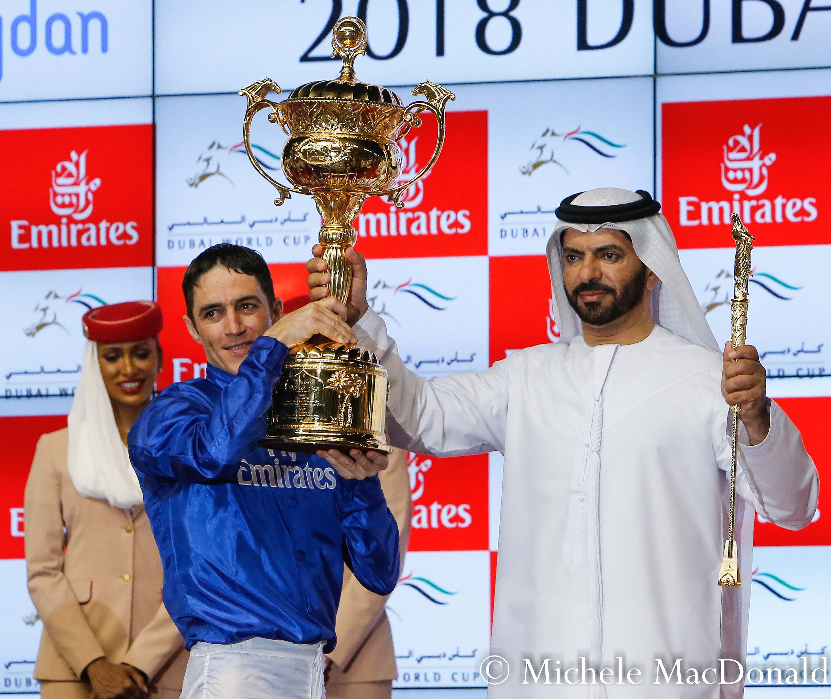 Christophe Soumillon and Saeed Bin Suroor with the Dubai World Cup trophy on Saturday. They will be hoping to get their hands on another prestigious trophy at Churchill Downs in November. Photo: Michele MacDonald