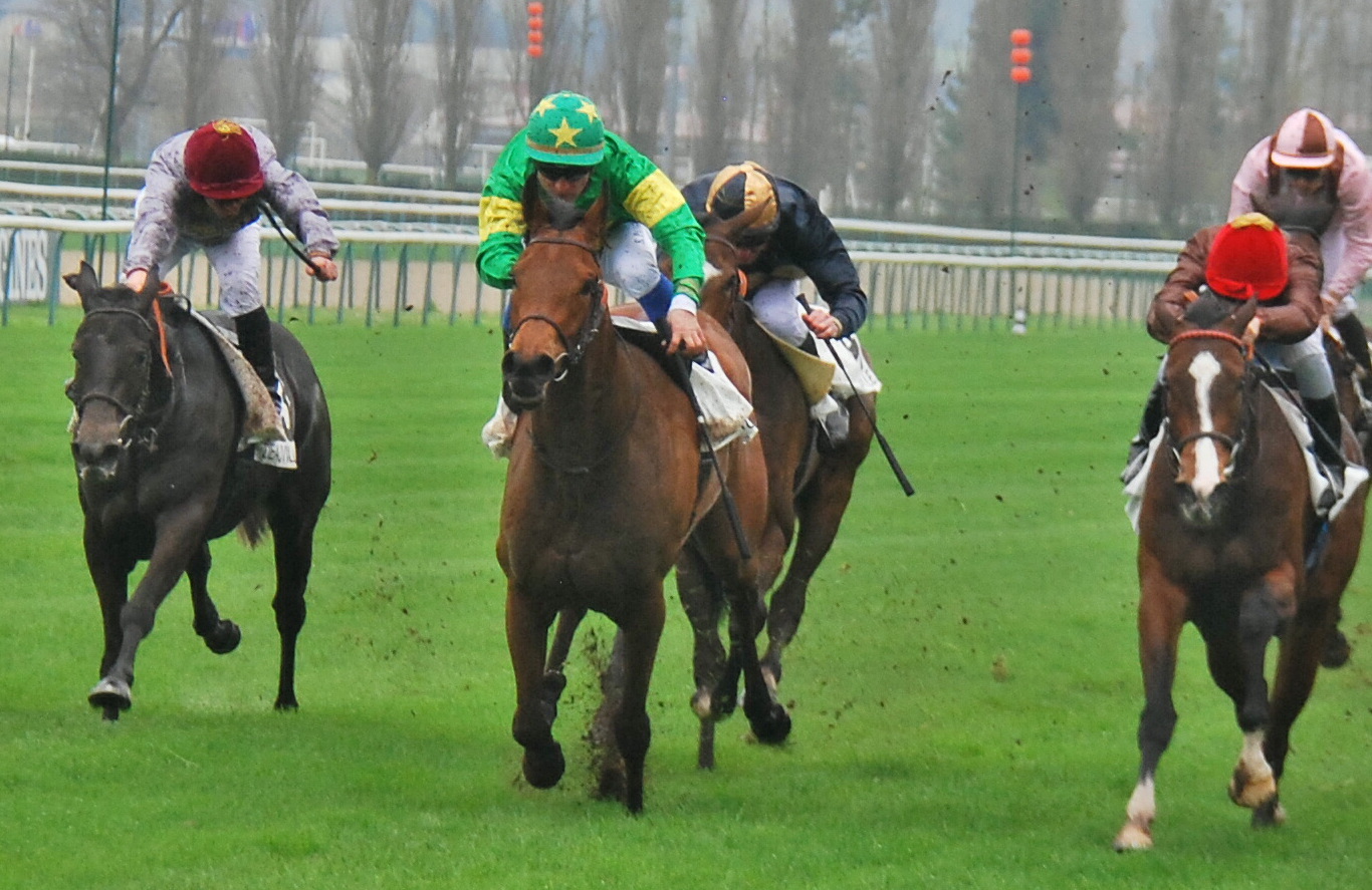 Coeur de Beaute (green colours) takes up the running close home on her way to victory in the G3 Prix Imprudence at Deauville last month. Photo: John Gilmore