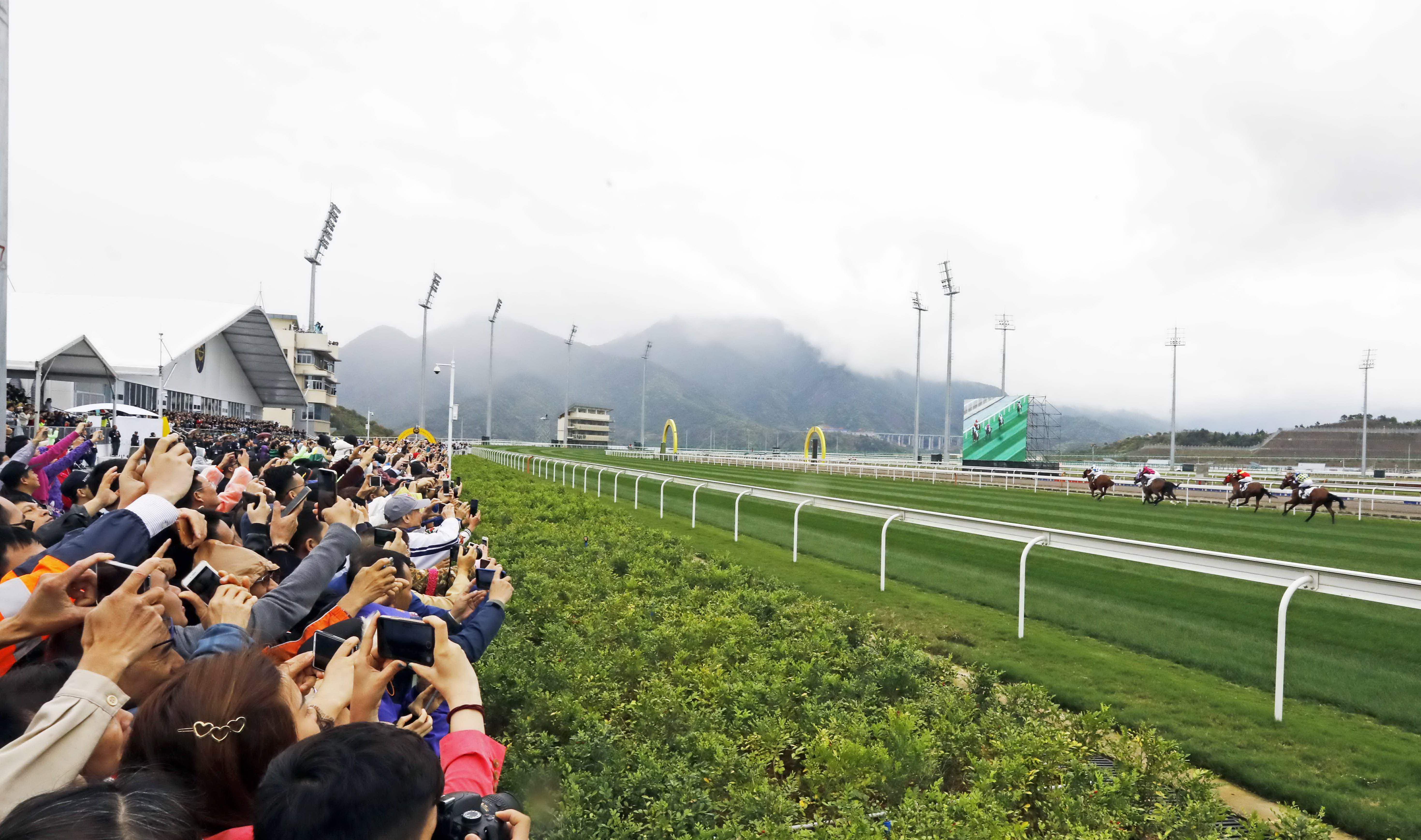 It was estimated that 95 per cent of the 3,500 crowd had never been racing before, but they certainly seemed engrossed by the action. Photo: Hong Kong Jockey Club
