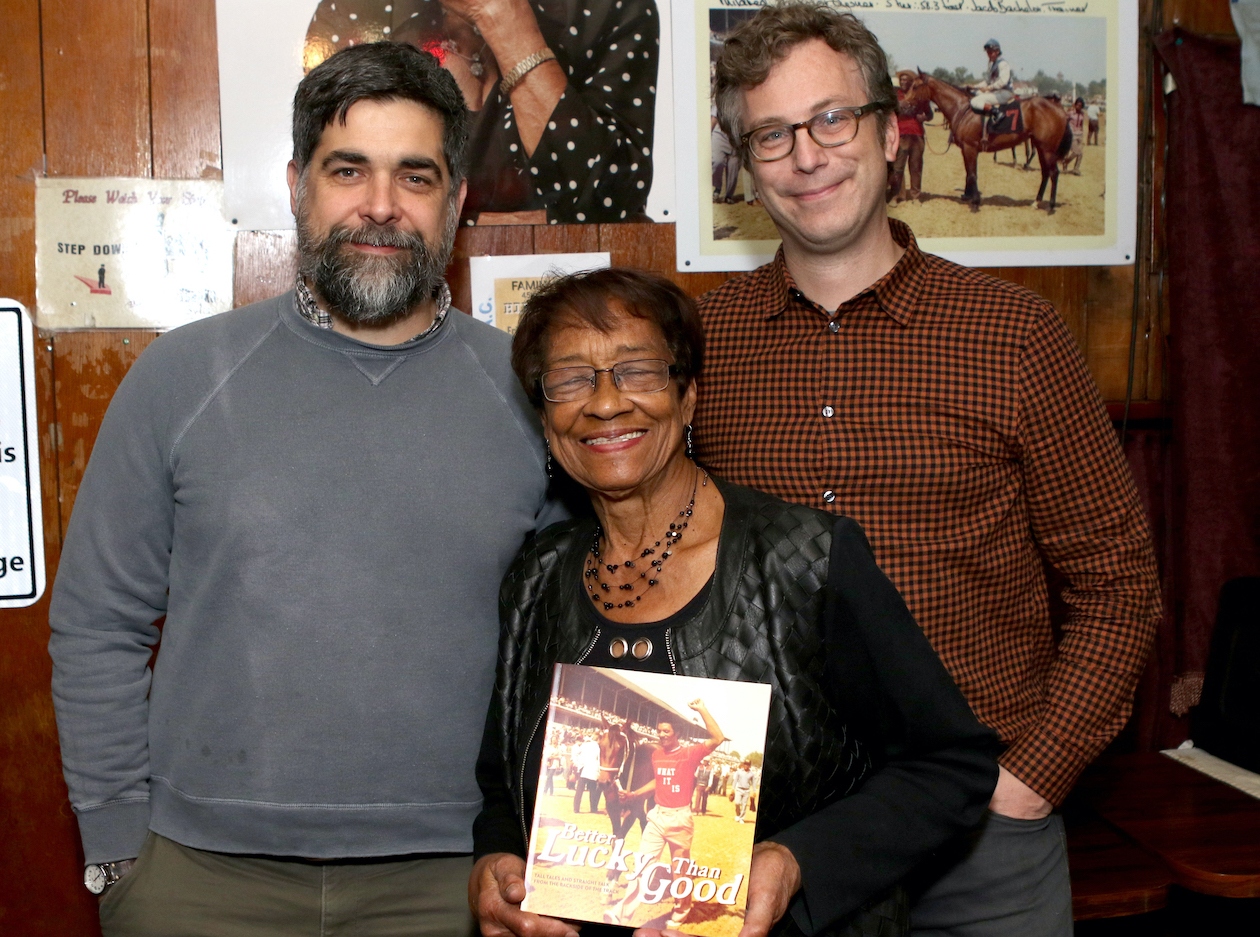 Ms Sylvia – and a copy of the new book – with Joe Manning (left), deputy director of the Louisville Story Program, and Darcy Thompson, executive director. Photo: George Williams