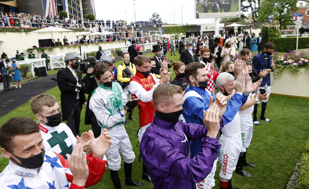 Popular success: Joe Fanning’s weighing-room colleagues welcome him back after his Gold Cup victory on Subjectivist at Ascot in June 2021. Photo: Dan Abraham / focusonracing.com