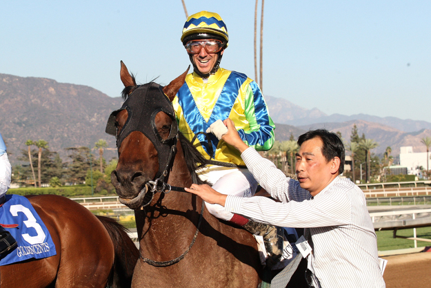 Jockey Olivier Doleuze and trainer Michael Chang after Rich Tapestry's win in the G1 Santa Anita Sprint Championship. Photo: Benoit Photo.