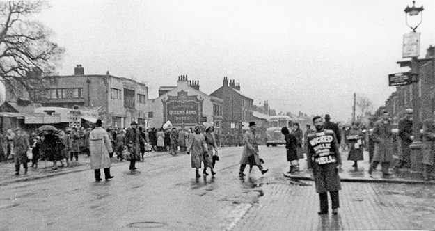 Crowds outside Aintree Racecourse on Grand National day in 1955. Photo: Ben Brooksbank/Wikimedia Commons.