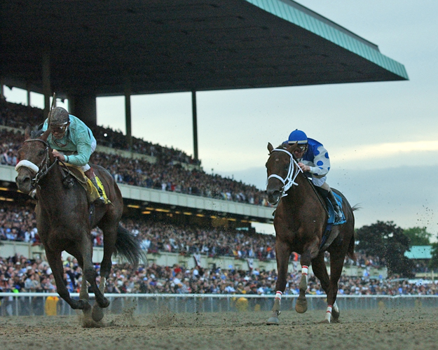 Birdstone runs by Smarty Jones in the 2004 Belmont Stakes. Photo: NYRA/Adam Coglianese.