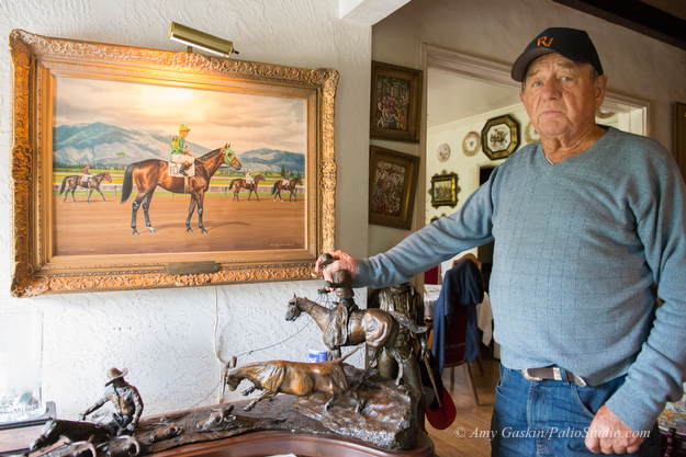Bruce Headley collects art from around the world. Many racing related sculptures and paintings adorn his home. Photo: Amy Gaskin/PalioStudio.com