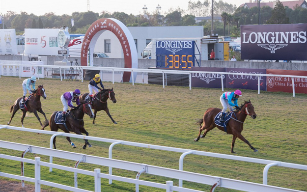 Commengy and jockey Shan Hailong won the Longines Mile Race during the China Equine Cultural Festival 2014 in Shanghai. Photo: Longines.