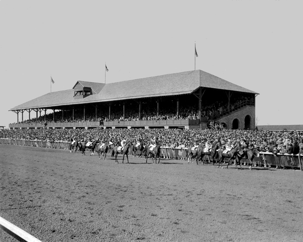 Grandstand, photographed in 1939, shared the same limestone, timber, and slate palette of materials as the clubhouse. Photo: Keeneland Library.