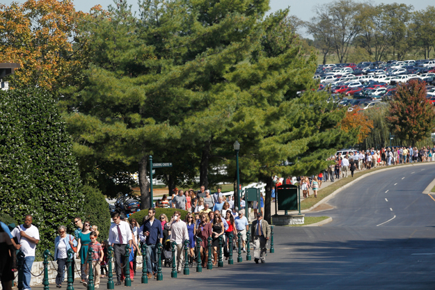 Racegoers walk from The Hill to the entrance. Photo: Keeneland.