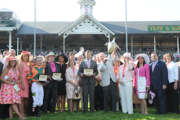 Lovely Maria's connections, with Jones holding the trophy in the center, celebrate her win in the 2015 Longines Kentucky Oaks at Churchill Downs. Photo: Diane Bondareff/Invision for Longines/AP Images