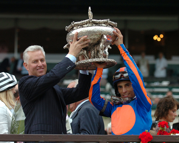 John Velazquez and trainer Todd Pletcher hold up the trophy after winning the 2007 Belmont Stakes with Rags To Ritches. Photo: NYRA/Adam Coglianese.