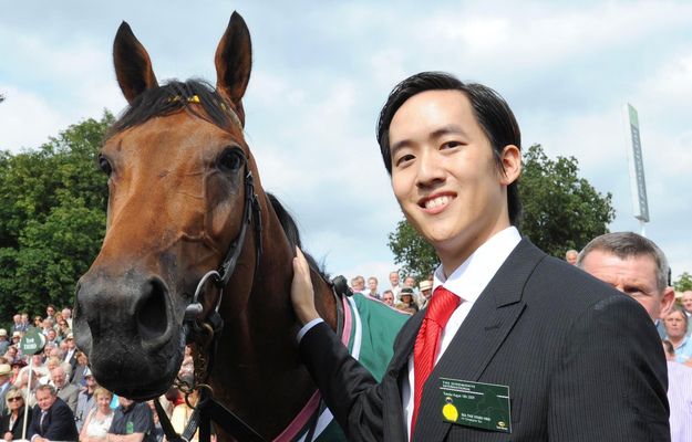 Christopher Tsui and Sea The Stars after winning the Juddmonte International Stakes at York. RacingFotos.com