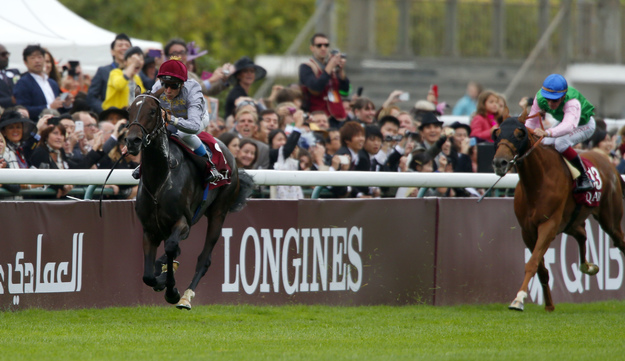 Treve and Thierry Jarnet win the 2014 Arc. Photo: RacingFotos.com