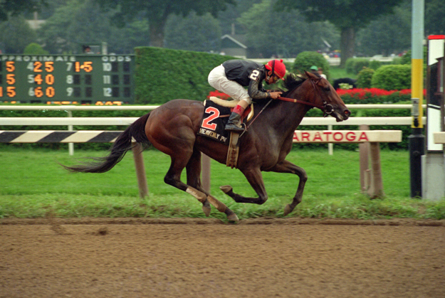 Heavenly Prize, owned by Ogden Phipps, and jockey Mike Smith win the G1 Alabama Stakes at Saratoga on August 13, 1994. Photo: NYRA/Coglianese Photo