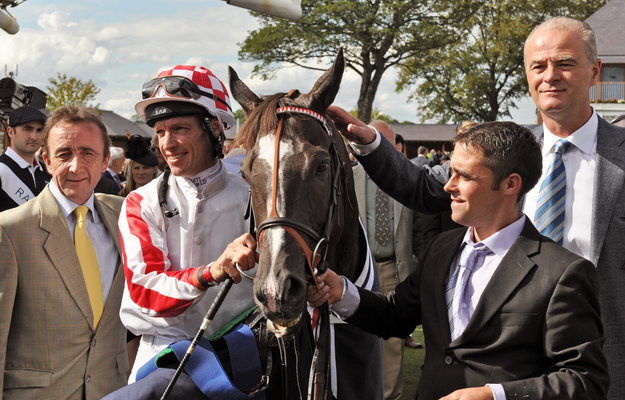 Sole Power with trainer Eddie Lynam, and jockey Richard Hughes. RacingFotos.com