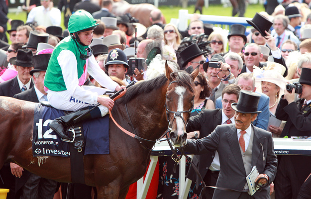 Workforce, with Ryan Moore up, and Khalid Abdullah after winning the 2010 Epsom Derby. RacingFotos.com