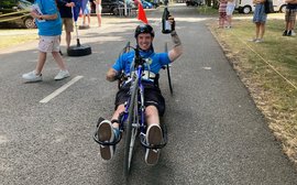 Paralysed former jockey raises thousands in hand cycle challenge