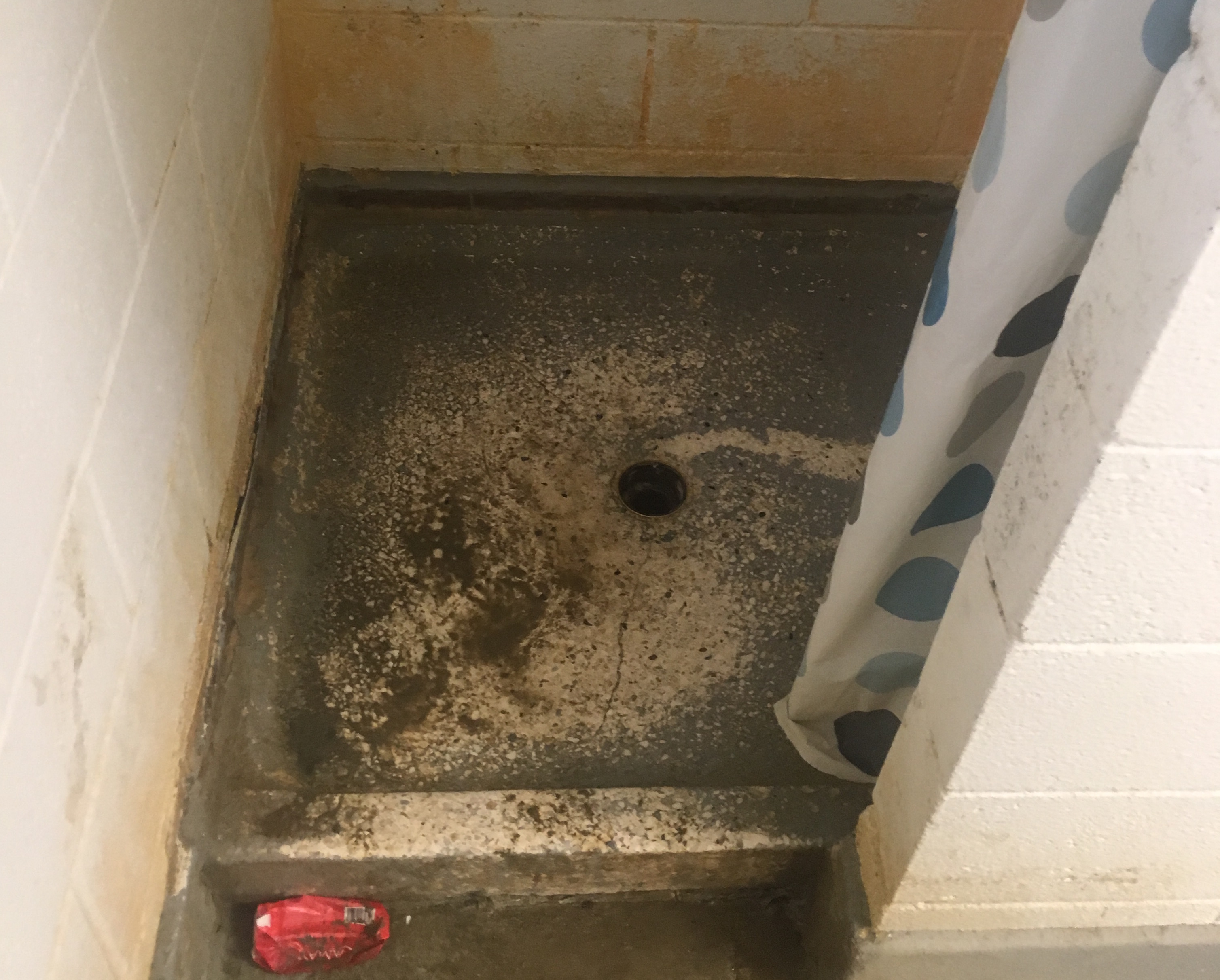 A shower in one of the bathrooms shared by backstretch workers at Santa Anita. This picture was also taken last weekend. Photo: Daniel Ross