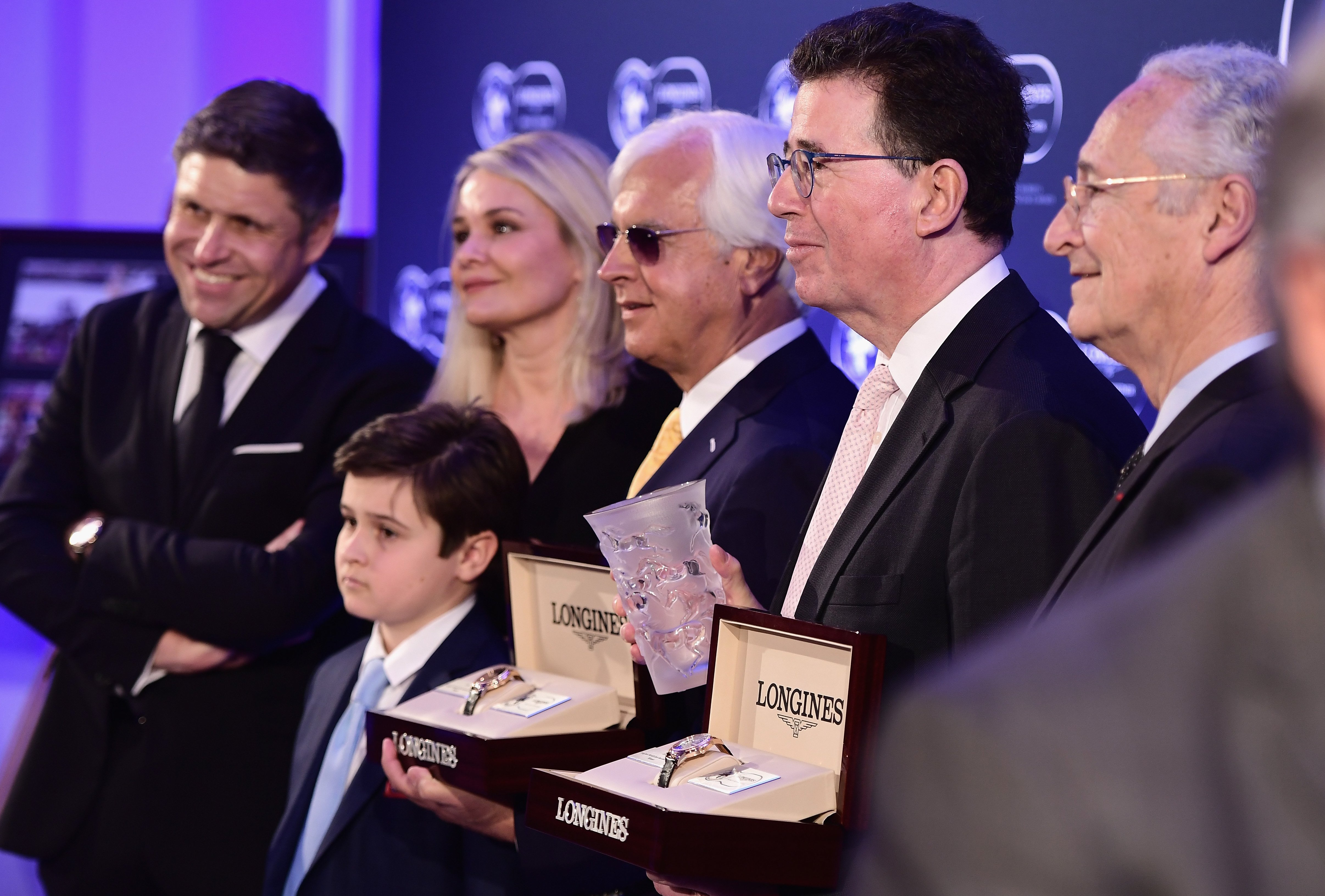 In honour of Arrogate: Juan-Carlos Capelli (left), Vice President of Longines and Head of International Marketing, Bob Baffert (centre) with wife Jill and son Bode, Lord Grimthorpe (second right), Juddmonte’s European racing manager, and IFHA chairman Louis Romanet. Photo: Longines