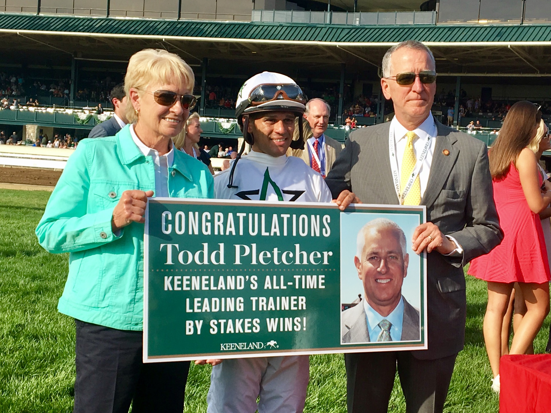 Ginny DePasquale with Javier Castellano and Todd Pletcher and the Keeneland placard. Photo: Keeneland/Coady Photography