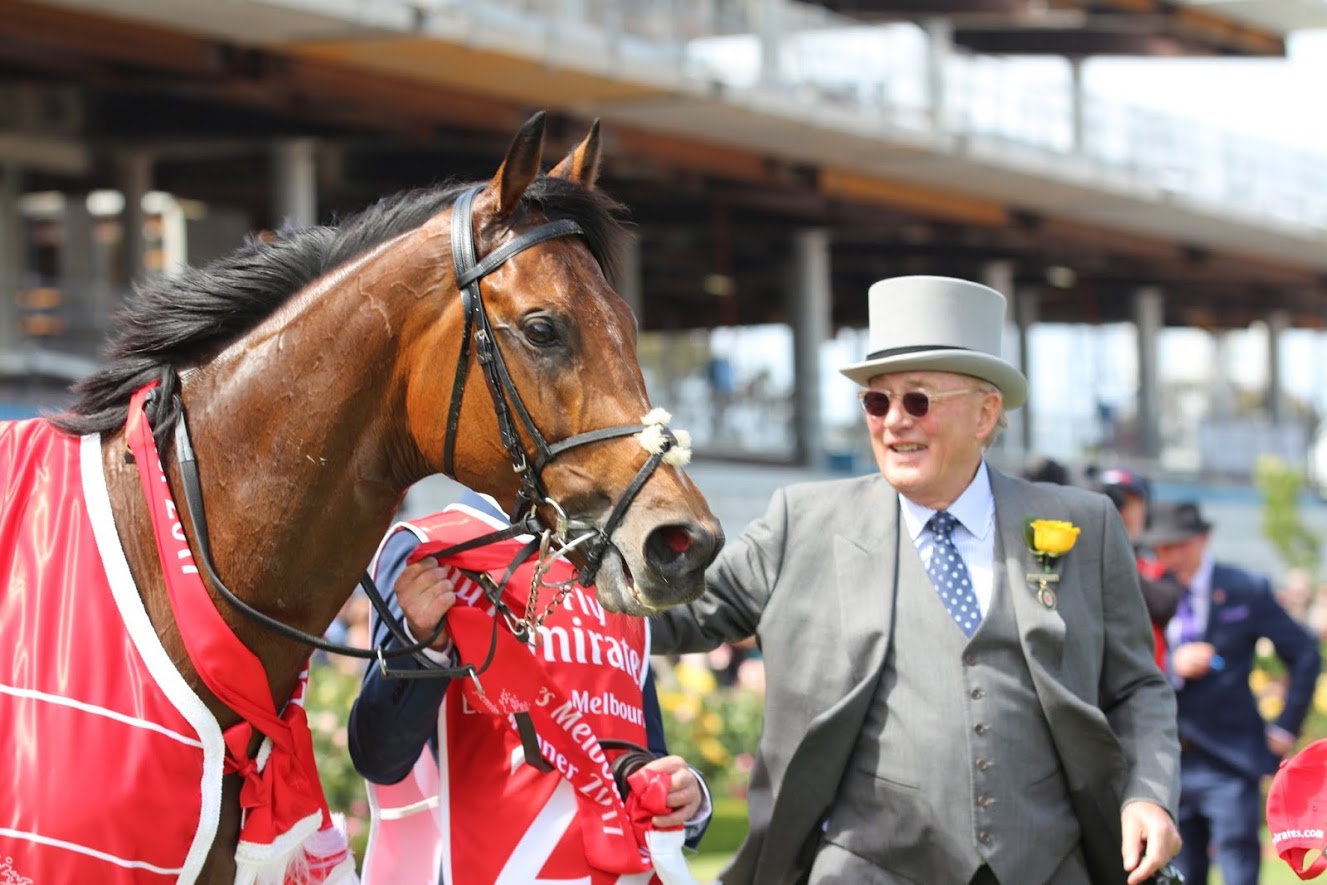 Melbourne Cup winner Rekindling, by some way the youngest horse in the race, with owner Lloyd Williams. Photo: Kristen Manning