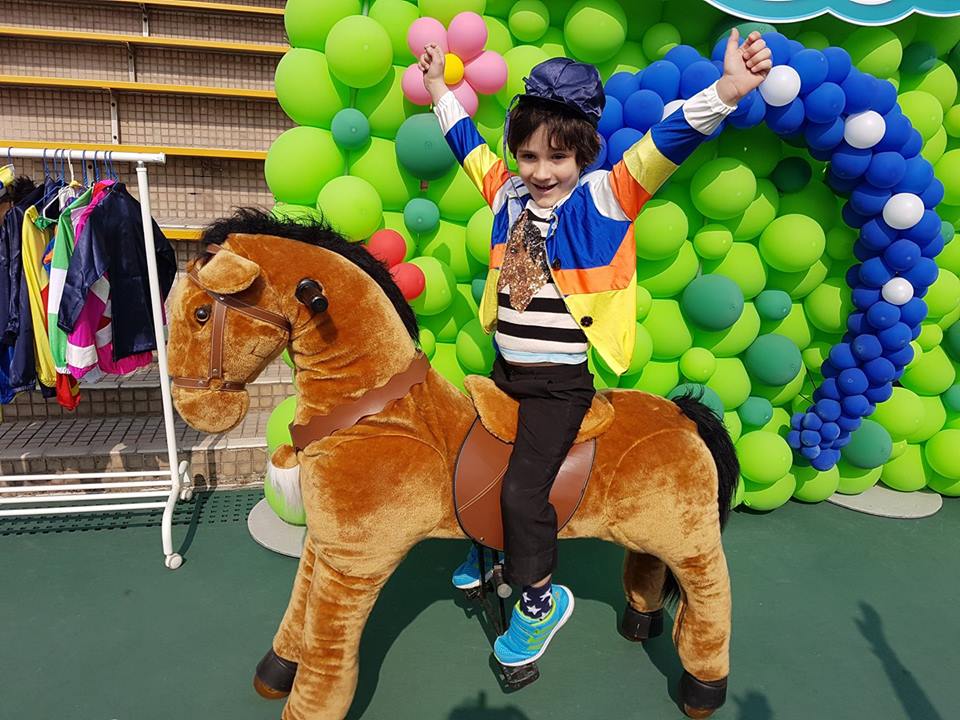 Children loved dressing in jockey silks and having a moment on the back of a pretend horse. Photo: Kristen Manning