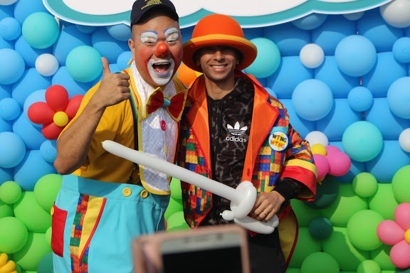 Getting into the spirit of it all: Moreira with the clown, and some of his props. Photo: Kristen Manning