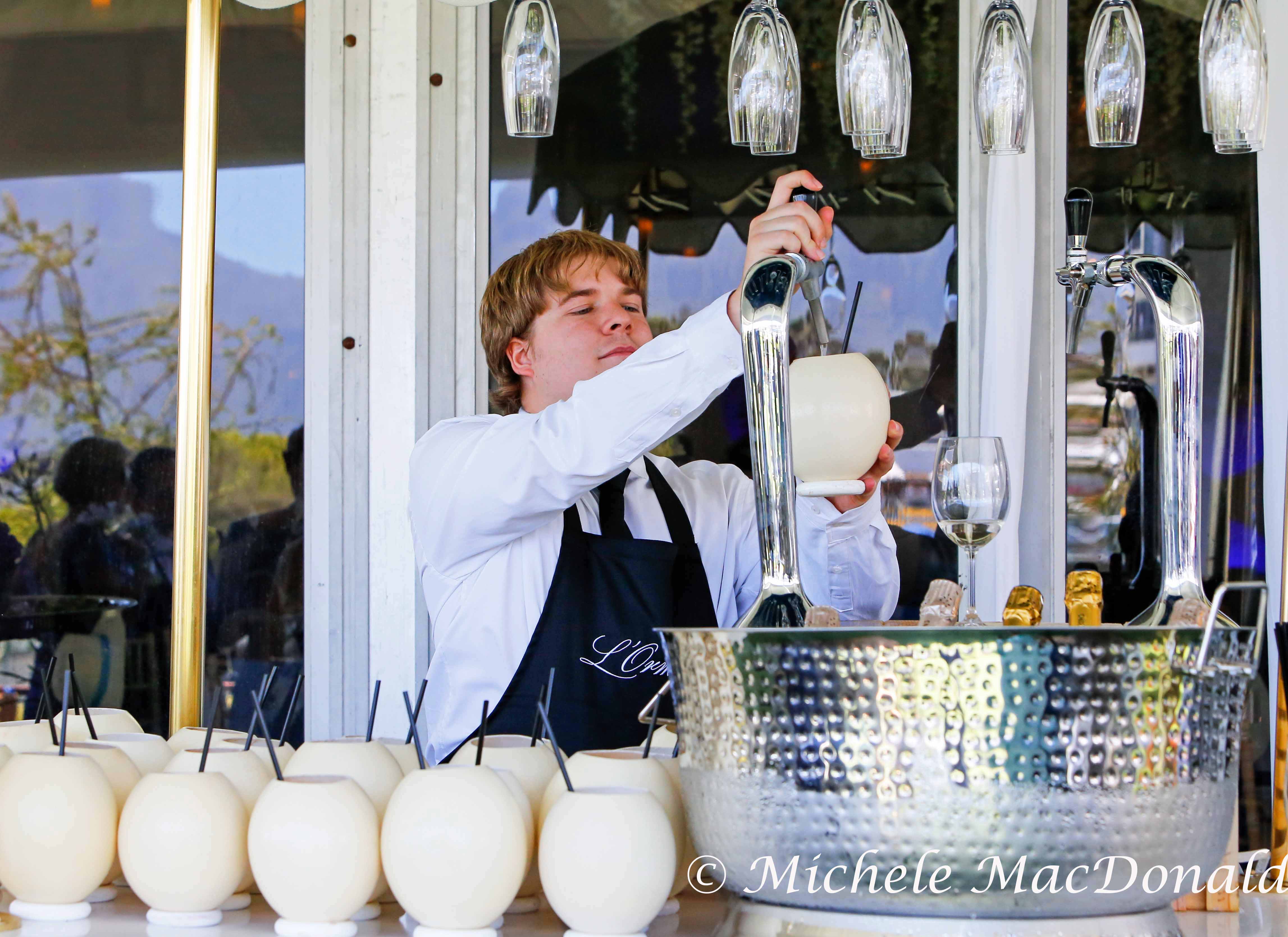 Champagne cocktails served in hollowed out ostrich eggs help fuel the intensity of fun. Photo: Michele MacDonald