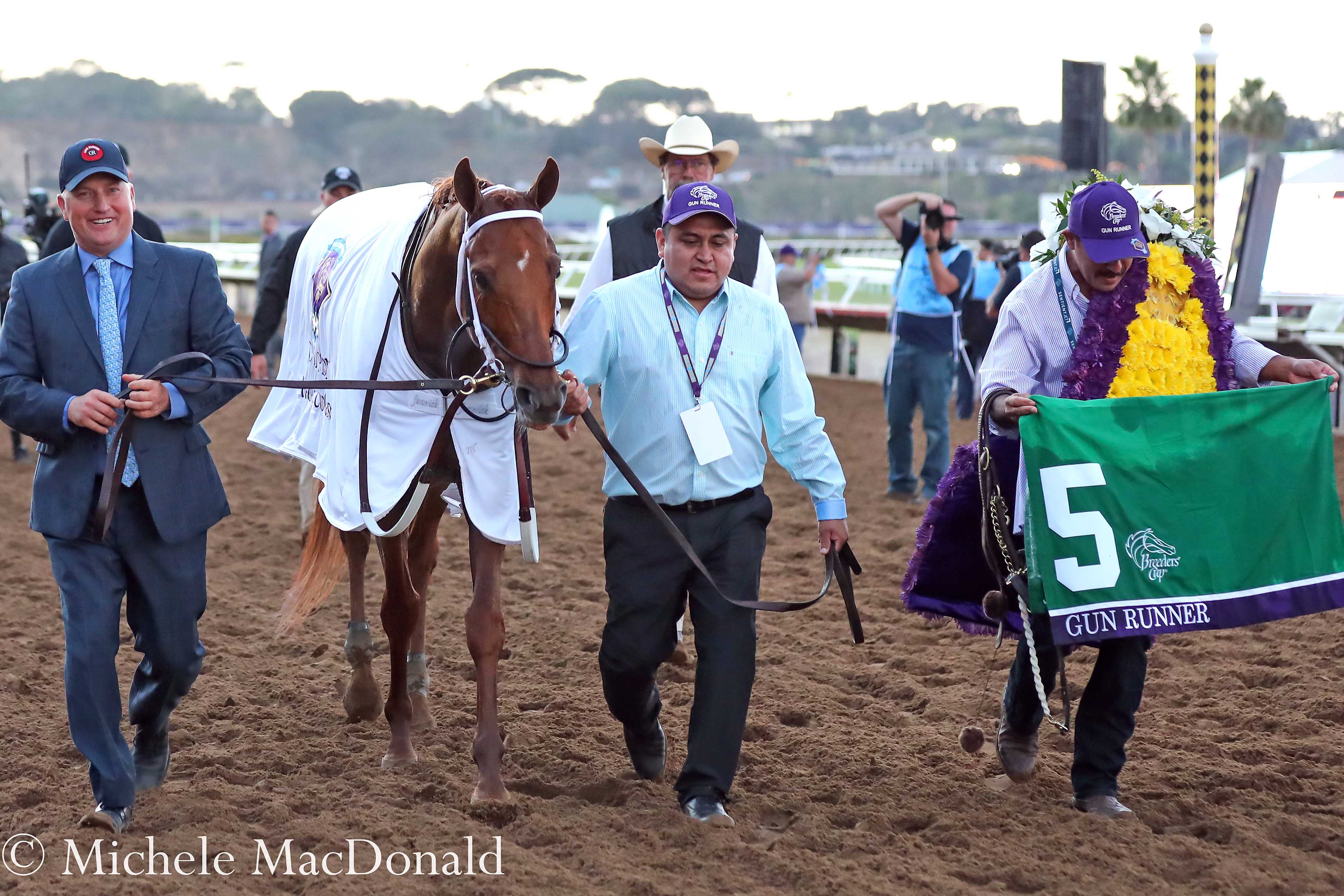 “How Gun Runner recovered from [the Dubai World Cup] was pretty special — and a sign that there were, perhaps, better things to come,” says chief assistant trainer Scott Blasi, pictured on the left with Gun Runner after the BC Classic. Photo: Michele MacDonald