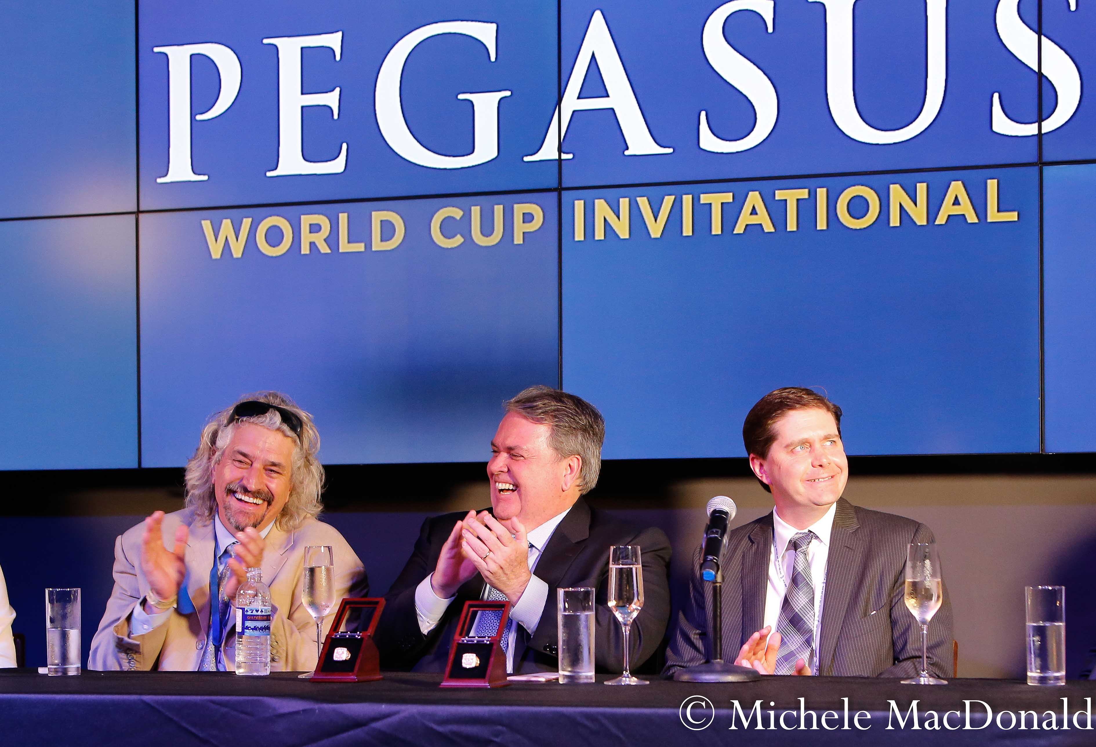 Bittersweet ending: Gun Runner’s trainer Steve Asmussen with owners Goncalo Torrealba of Three Chimneys (center) and Ron Winchell at the post-race press conference. Photo: Michele MacDonald