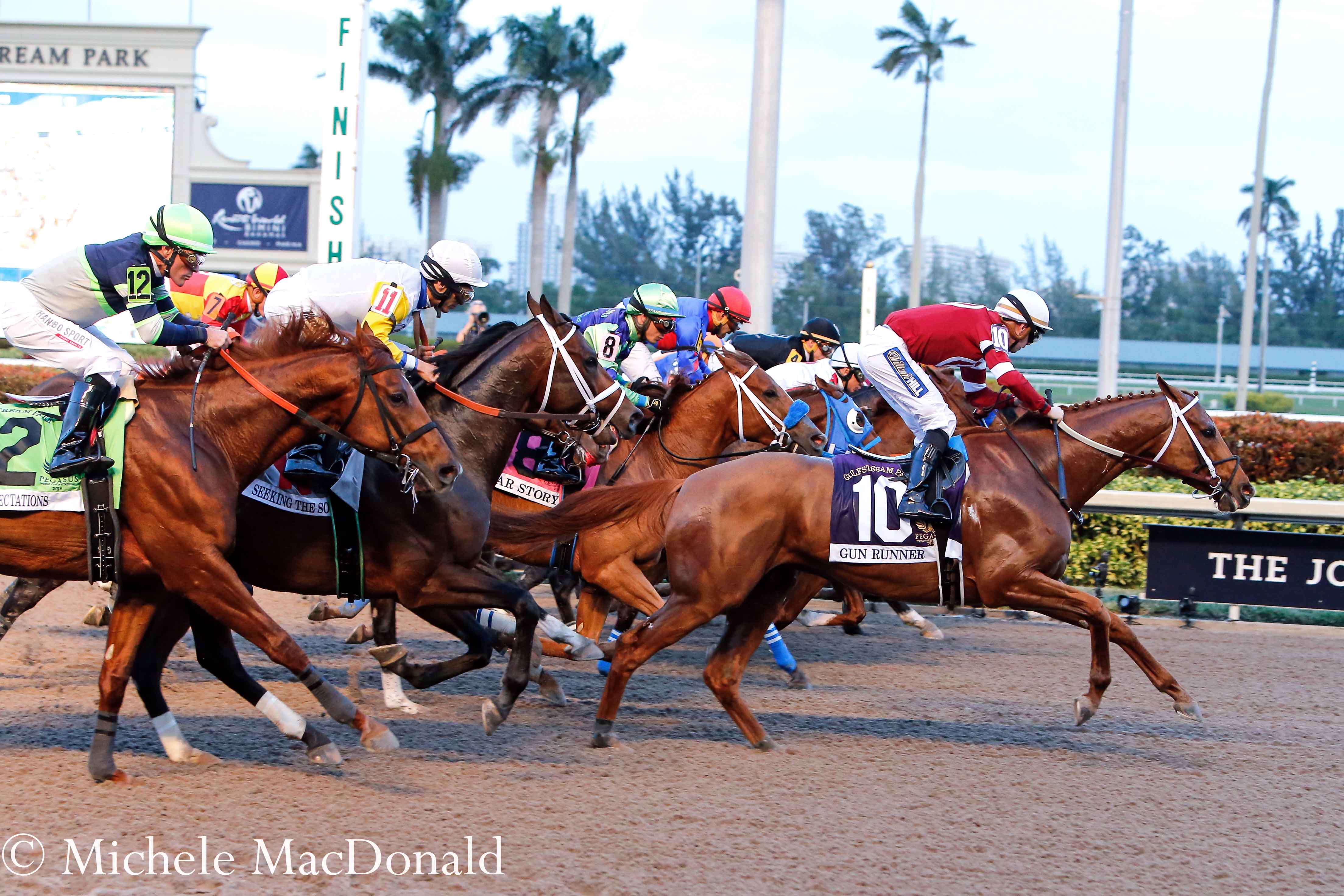 Masterstroke: Florent Geroux and Gun Runner are lightning quick out of the gate, enabling them to angle towards the inside before the first turn. Photo: Michele MacDonald