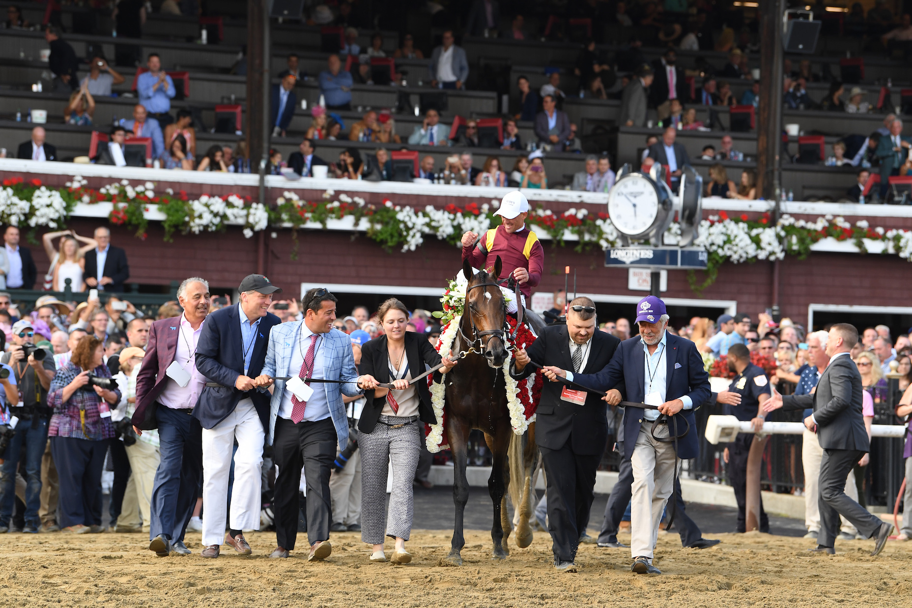 Enthusiastic connections greet Catholic Boy after his Travers victory. Photo: Chelsea Durand/NYRA.com