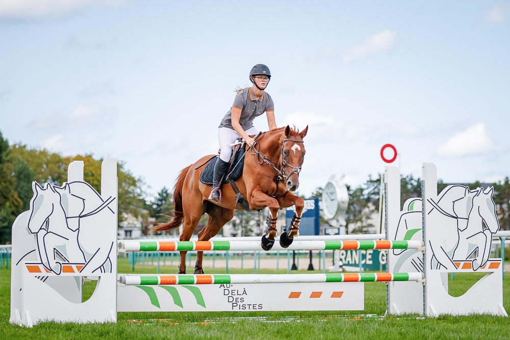 Going clear: Vallee Collins, ridden by Virginie Terryn, takes one of the jumps in his stride. Photo: Zuzanna Lupa