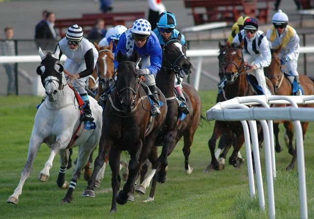 Jørgensen (spotted cap, against the rail) on Firello, the horse that kept him out of retirement. Photo: Vidar Kalnes