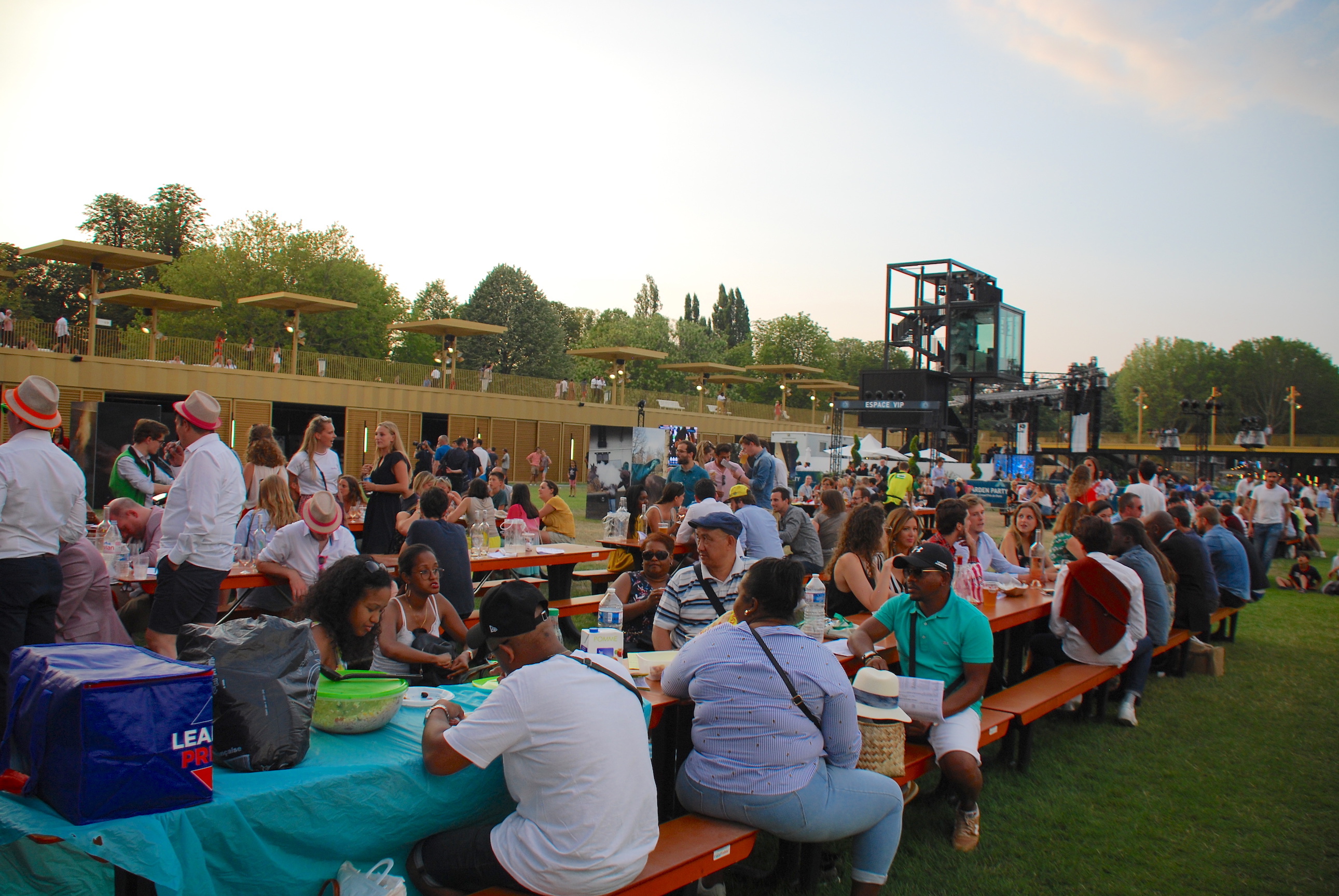 Spectators preparing for an after-racing evening of music and entertainment in the new grassed area at ParisLongchamp on Grand Prix de Paris day in July. Photo: John Gilmore 