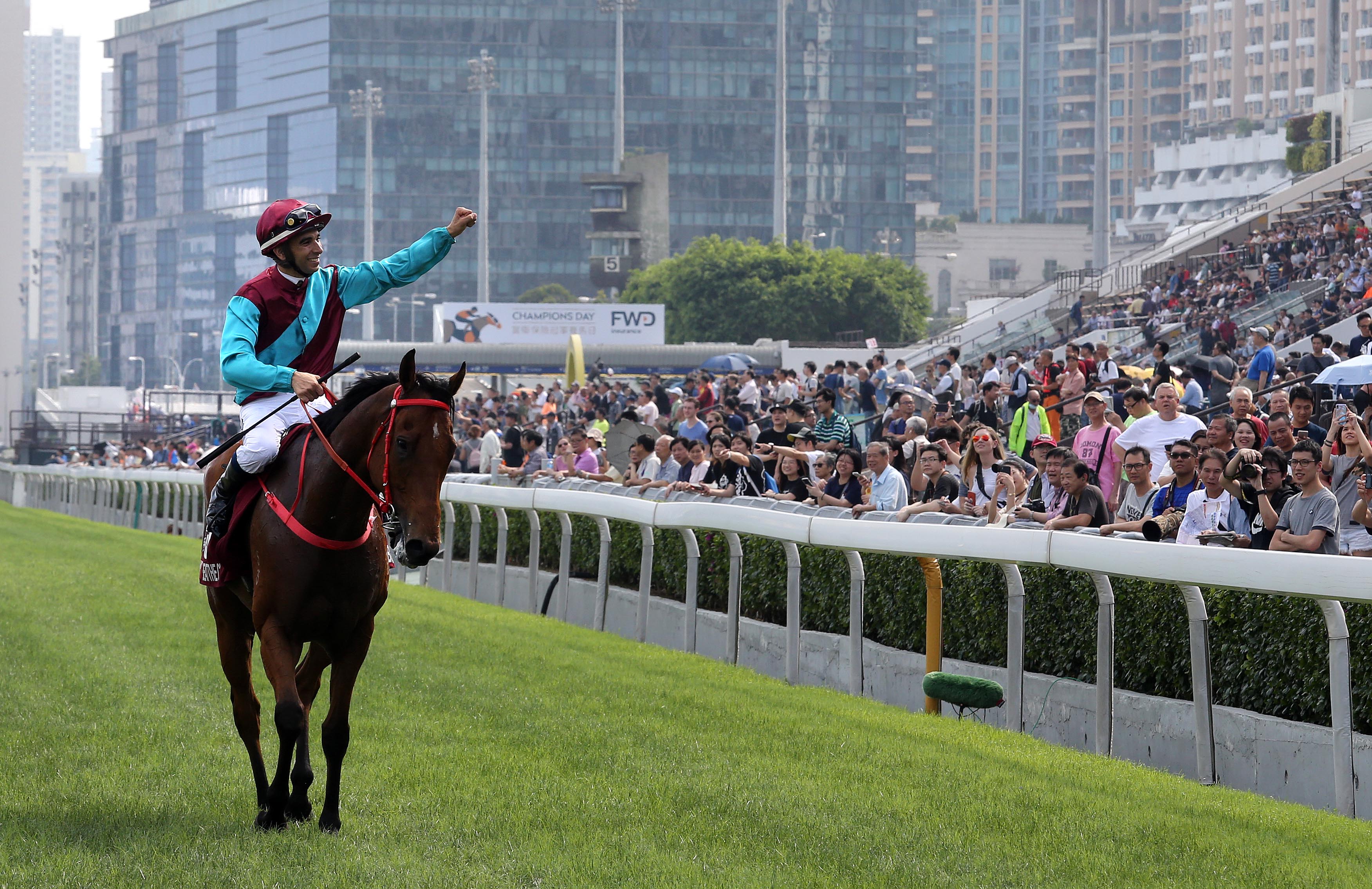 Joao Moreira salutes the Sha Tin crowd after Beat The Clock’s narrow victory in the G1 Chairman’s Sprint Prize. Photo: Hong Kong Jockey Club