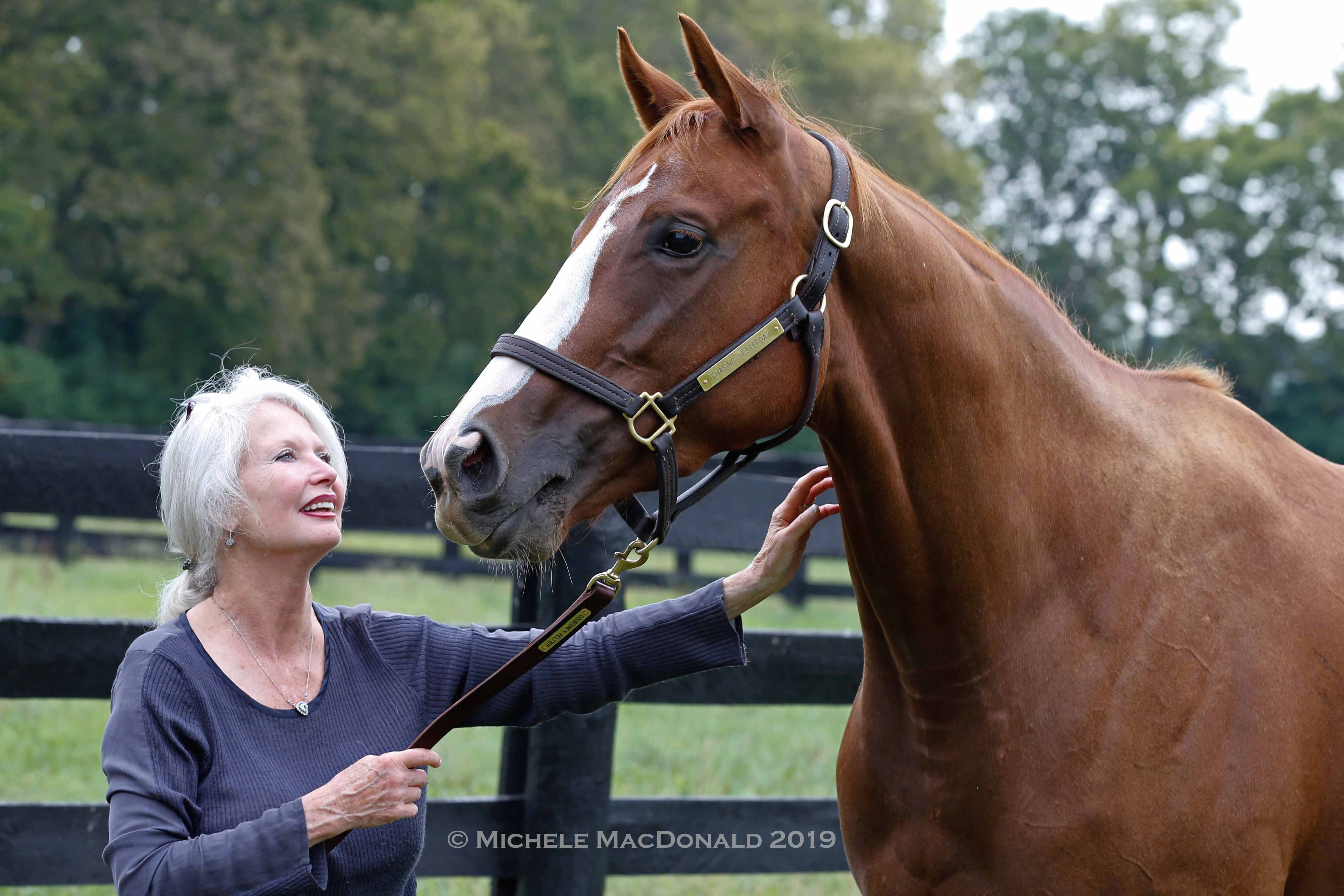 Jane Lyon with Chasing Yesterday, Littleprincessemma’s second foal at Summer Wind. The Tapit filly, named in memory of her late husband, provided Lyon with her first elite victory as an owner. Photo: Michele MacDonald