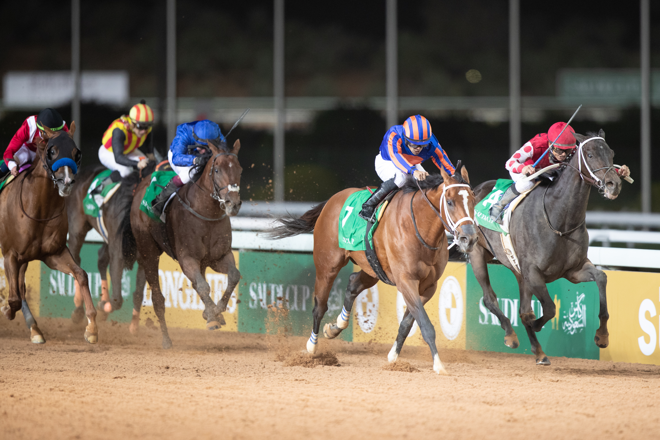 Maximum Security (second right) wins from Midnight Bisou, with Benbatl (blue) third ahead of Mucho Gusto (left) fourth and Gold Dream, who finished sixth. Photo: Jockey Club of Saudi Arabia