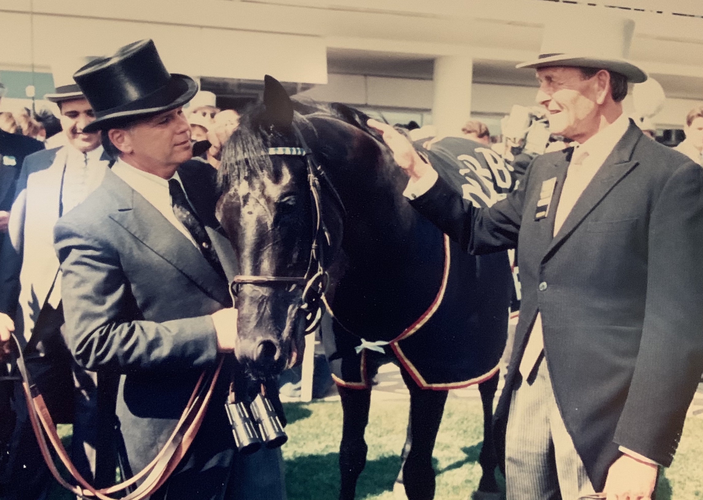 Crowning glory: Erhaab with Shadwell’s Rick Nicholls and trainer John Dunlop after his 1994 victory at Epsom Downs