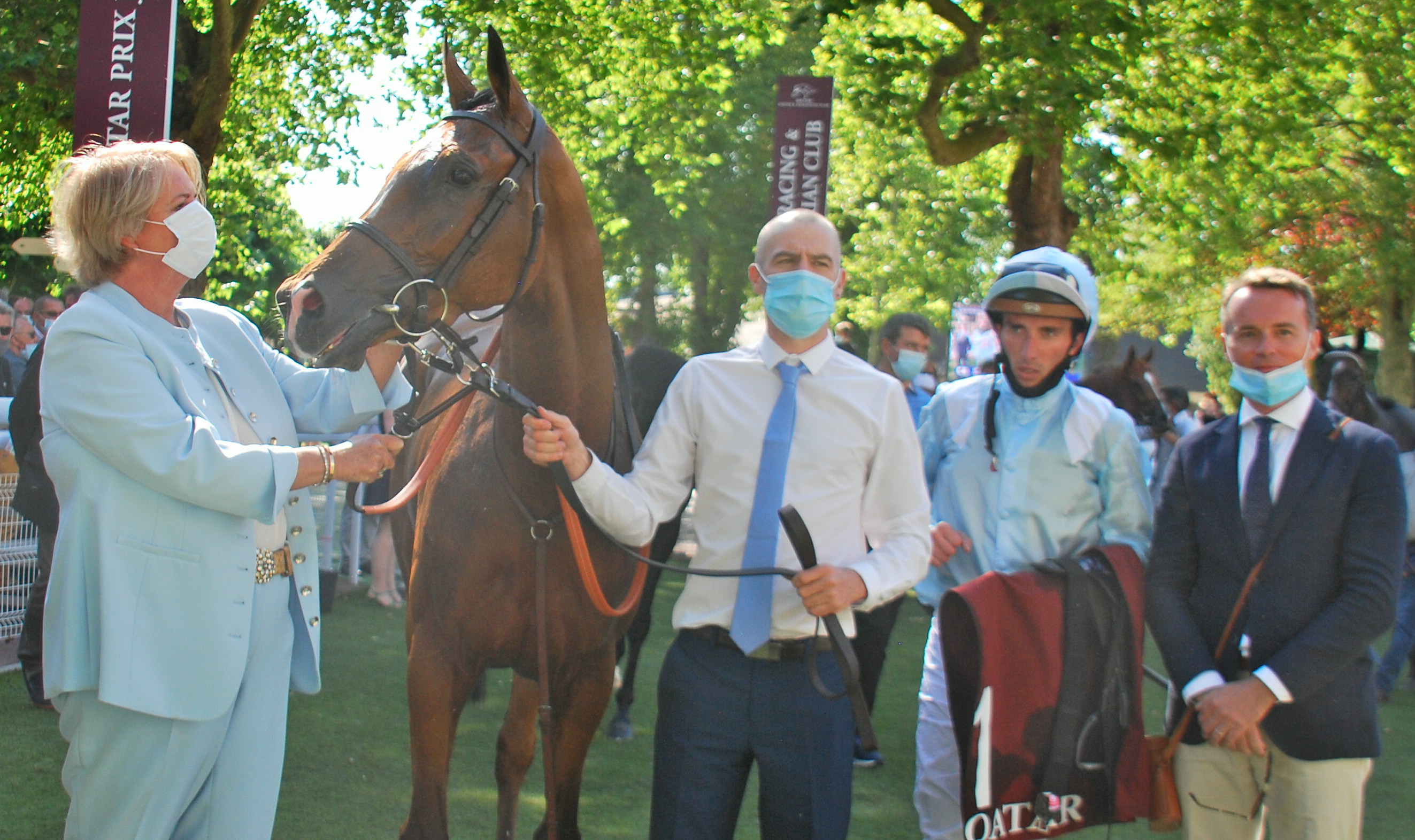 Antoinette Tamagni-Bodmer with Watch Me in the winner’s enclosure at Deauville on July 12. Trainer Francis-Henri Graffard is on the right. Photo: John Gilmore