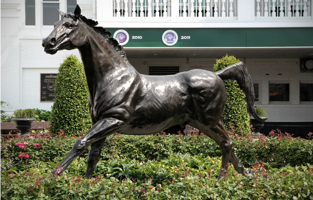 This bronze of the first Kentucky Derby winner, Aristides, stands in Churchill Down’s courtyard, just behind the Twin Spires grandstand. The horse was trained and ridden by black men. Photo courtesy Deborah Mac