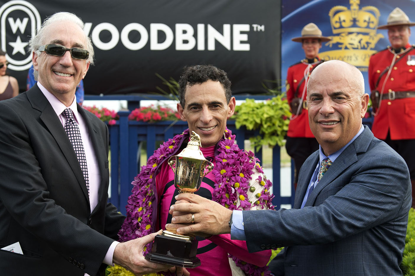 Mark Casse (right) pictured with owner Gary Barber and jockey John Velazquez after winning the 2018 Queen’s Plate at Woodbine with Wonder Gadot. Photo: Michael Burns