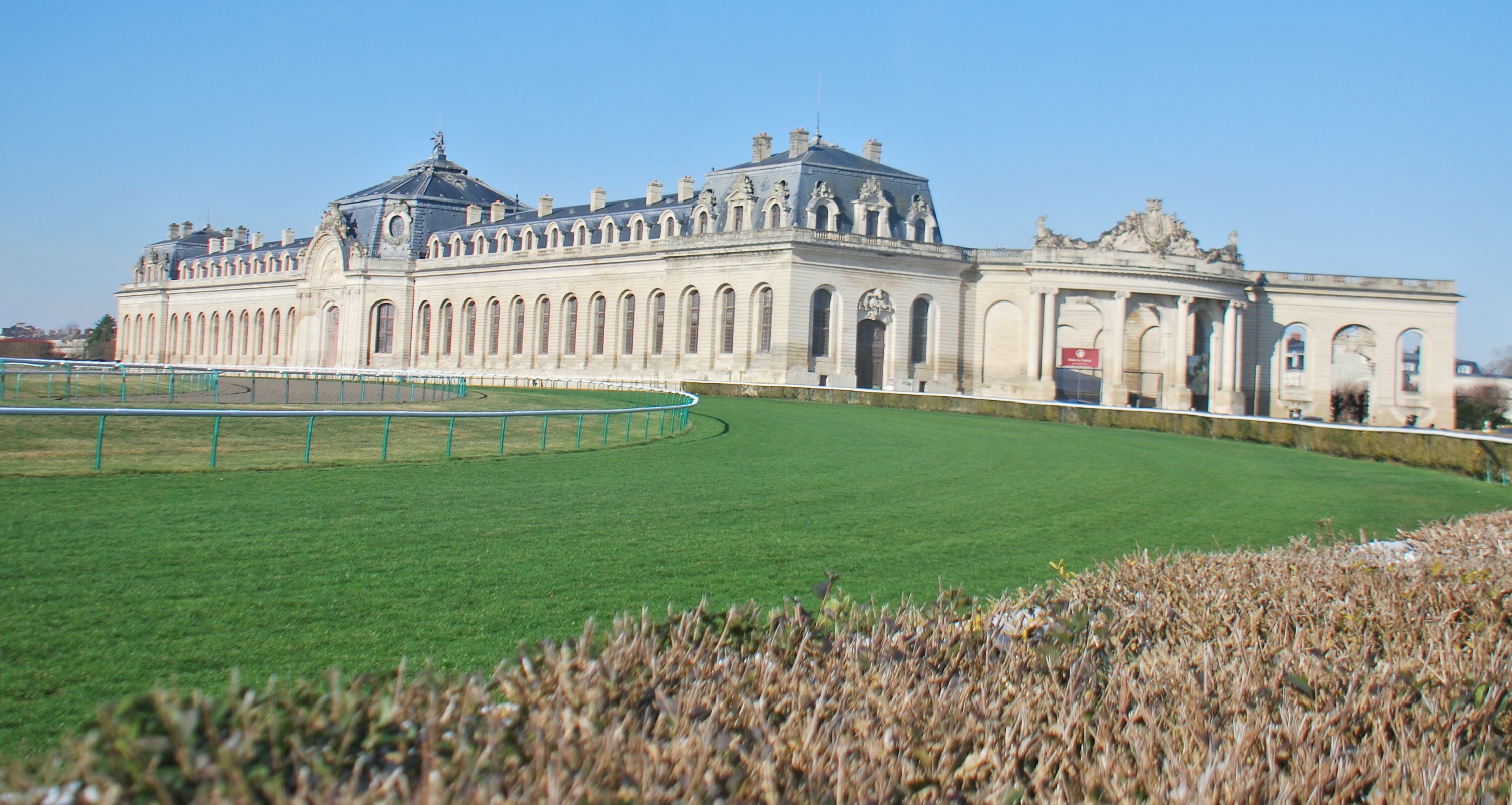 The magnificent Grandes Ecuries, formerly housing the Duc d’Aumale’s stables, sit alongside the racecourse. Photo: John Gilmore
