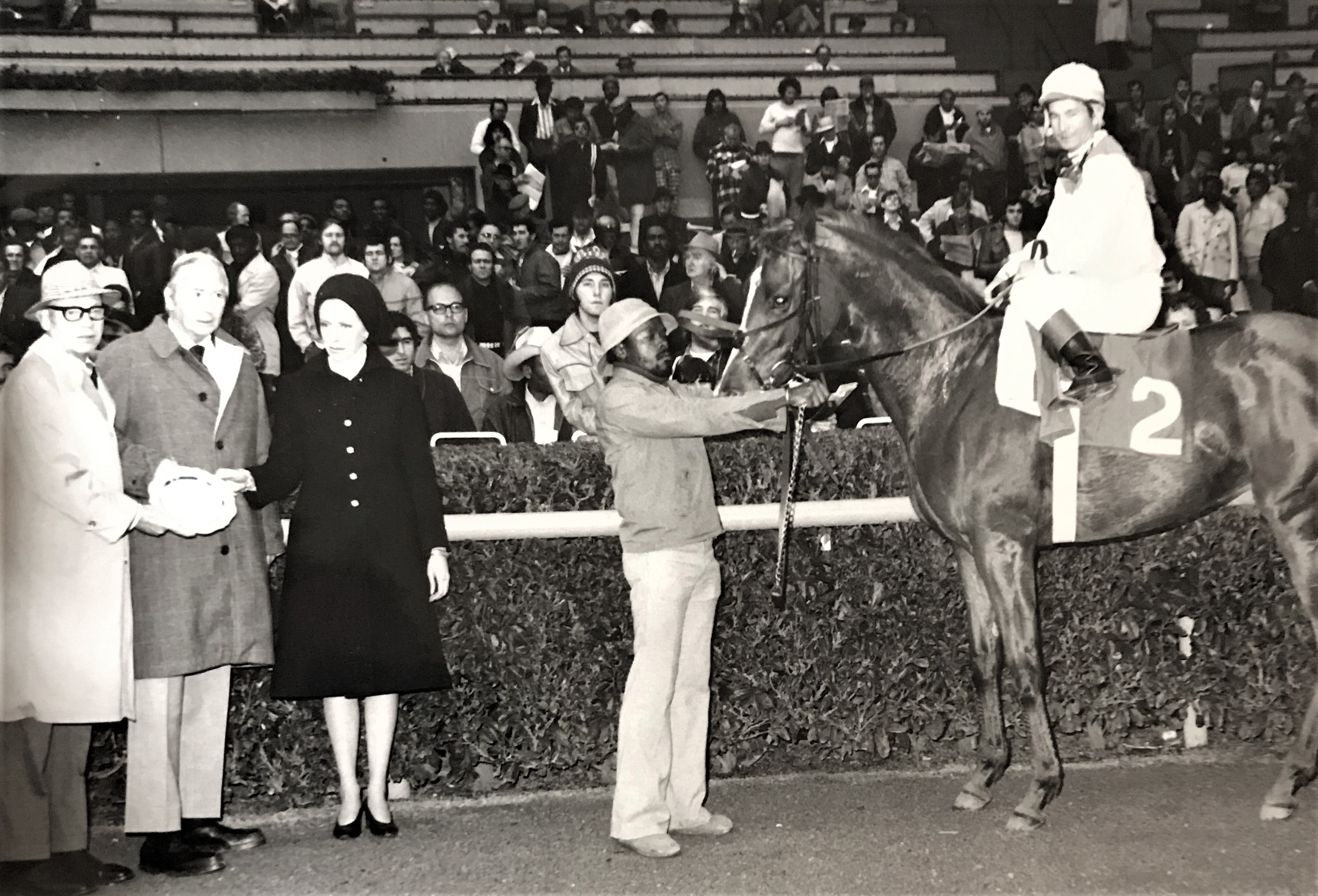 Sarsar and Bill Shoemaker with John Flakes after their victory in the 1975 La Centinela Stakes at Santa Anita. Owners Mr and Mrs William Haggin Perry and Santa Anita executive Wilb Rydbeck are on the left. Photo: Vic Stein 