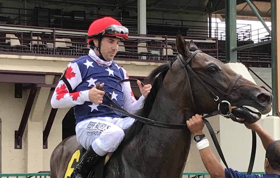 Settling in: Joe Talamo on his way to the winner’s circle at Ellis Park