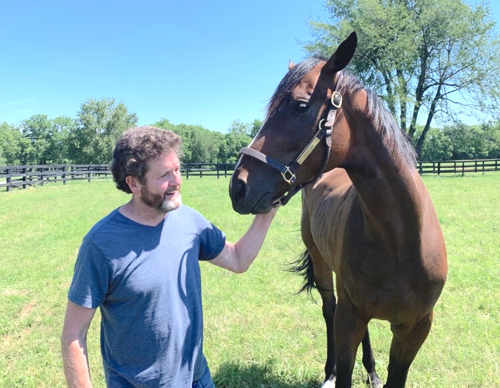 An unexpected pleasure: The author is temporarily reunited at Old Friends with with Signalman, a G2-winning juvenile and BC Juvenile third during his time as assistant trainer with Kenny McPeek. Photo: Michael Blowen
