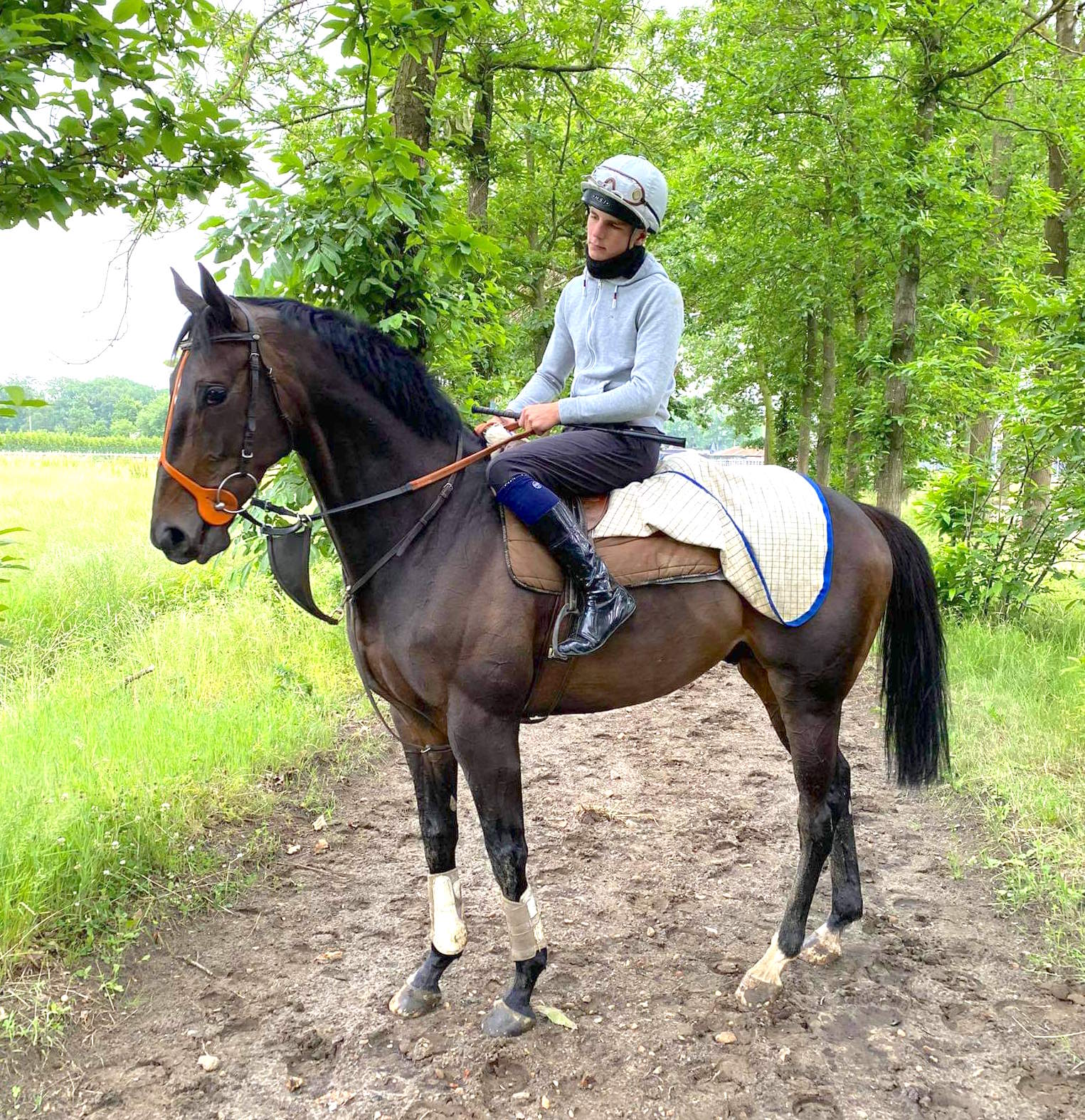 Back home: Pradaro and work rider Cyril Vermeire on the training area at Westmeerbeek